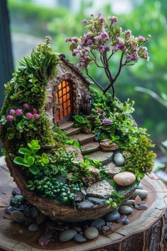 a small house made out of rocks and plants