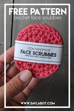 someone is holding up a crochet face scrubber