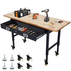 a workbench with tools on it, including drillers and screwdrivers