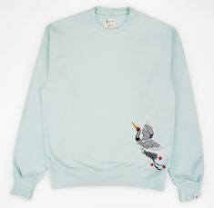 Completely embroidered crane sweater in arctic blue Brushed Pure Organic Cotton 300GSM  which is a very luxurious feel - not your cheap quality sweaters! DELIVERY All items will be delivered within 5 working days. Harajuku style and Japanese art inspired design. We also have Japanese streetwear hoodies on sale! Everything we sell is from anime inspiration which enabled us to create anime shirts, anime hoodies, styled in japanese clothing. Thank you for checking our shop! Quality Sweaters, Anime Inspiration, Anime Shirts, Crane Design, Japanese Clothing, Heavy Sweaters, Harajuku Style, Pet Sweater, Arctic Blue