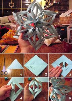 some paper snowflakes are being made with scissors