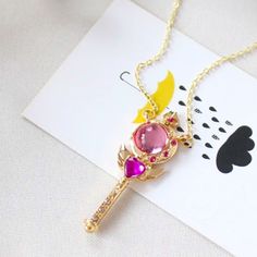 Loving Wand Pendant Sailor Moon Necklace Brand New Boutique Item Offers Welcome Bundle & Save Dm For More Info On Deals, Discounts, & Details! Pet Free, Smoke Free, & Dust Free Environment All Items Listed In This Shop Are Stored In Protective Covering And Quickly Shipped With Extra Care! #Anime #Sakura #Kawaii #Lovekey #Cardcaptor Anime Jewelry Necklaces, Kawaii Metal Jewelry For Gifts, Kawaii Metal Jewelry, Kawaii Pendant Jewelry Gift, Kawaii Round Jewelry Gift, Kawaii Pendant Jewelry For Gifts, Kawaii Round Jewelry For Gift, Kawaii Pendant Jewelry As A Gift, Handmade Kawaii Gold Jewelry