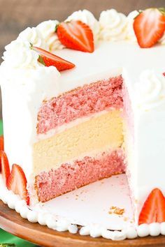 a strawberry cake with one slice cut out