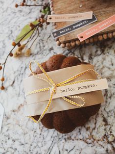 a cake wrapped in brown paper and tied with twine