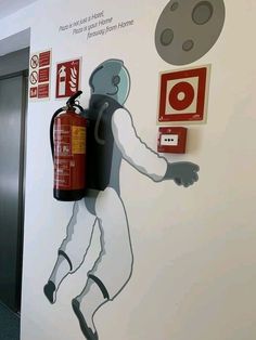 there is a fire extinguisher on the wall