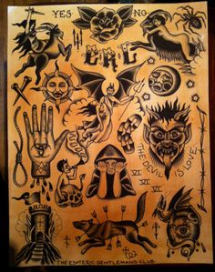 an old school tattoo design on a piece of paper with various symbols and tattoos written in it