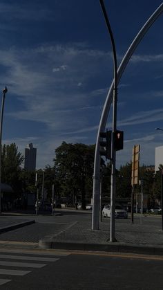 an intersection with traffic lights and street signs