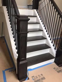 the stairs are being painted black and white