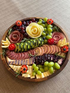 a wooden platter filled with different types of food