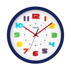 a blue and white clock with colorful numbers on it's face in the shape of a circle