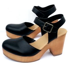 Step Out In These Adorable Faux Wood Platform Sandals New In Box Vegan Leatherette Material Adjustable Ankle Straps Lightly Padded Insole Comfy Light Weight Platform Stacked Heels Platform Height: 1 In Heel Height: 3.5 In. Fitting: True To Size. Regular Fit. Black Wedge Heel Clogs For Spring, Black Open Toe Clogs With Chunky Platform, Black Synthetic Clogs With Wedge Heel, Black Platform Clogs With Wedge Heel, Black Closed Toe Wedge Sandals Medium Width, Black Synthetic Clogs With Buckle Closure, Black Block Heels With Buckle Closure Medium Width, Black Wedge Sandals With Ankle Strap And Stacked Heel, Black Wedge Sandals With Stacked Heel And Ankle Strap