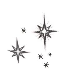 three black and white stars on a white background