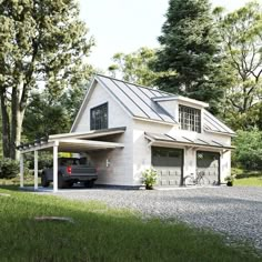 a car is parked in front of a white house with a metal roof and two garages