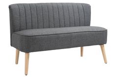 a gray couch sitting on top of a wooden frame