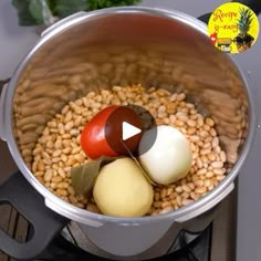 the food is being cooked in the pot on the stove top and ready to be eaten