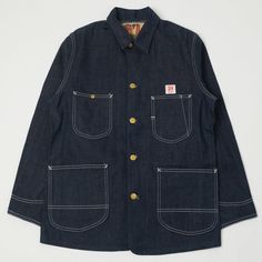 A standout piece from the Lee Archives collection, here comes the 1930s ‘Loco’ coverall jacket. Simple, yet inspiring in its detailing, this option offers and oversized/boxy shape which allows it to be easily layered up, and cuts a perfect heritage silhouette. The denim is an 11.5 ounce ‘Jelt denim’, which has been left raw, and ready to be broken in. Flat felled seams have been used throughout for durability, while custom manufactured brass ‘Union Made’ buttons add a touch of refined contrast t Denim Coverall, Blue Is The Warmest Colour, Denim Flats, Flat Felled Seam, Denim Workwear, 80s And 90s Fashion, Union Made, Washed Jeans, Clothing Co