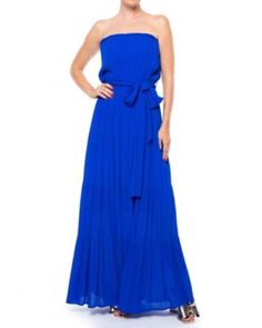 This strapless maxi dress is the most versatile dress you'll ever own! Perfect for date night or your next resort vacation, this dress can easily be dressed up or down and is sure to become a staple in your wardrobe for seasons to come. With an elasticized top neckline and true waist, this dress fits Queens of all shapes and sizes. This dress is fully lined to the knee and has a detachable, self tying belt at the waistline. The multi tiered skirt flows and flatters in all the right ways and the Pregnant Bridesmaid, Comfy Maxi Dress, Rayon Crinkle, Top Neckline, Resort Vacation, Dresses Royal, Strapless Maxi, Strapless Maxi Dress, Versatile Dresses