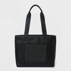 Whether headed to office or running errands during off-duty days, this Large Tote Handbag from Universal Thread™ will carry your essentials in style. This tote handbag in chic, classic black features a large shape that provides plenty of room to keep your keys, phone, wallet and other small essentials close at hand and neatly organized. The double handle makes for easy and comfy carrying, while multiple interior and exterior pockets let your store your stuff the way you want. Versatile and simpl Uniqlo Bags, Pink Crossbody Bag, Best Purses, Pink Tote Bags, Brown Leather Totes, Brown Tote, Woven Tote Bag, Straw Tote, Black Features