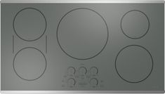 a stainless steel stove top with four burners and knobs on the front side