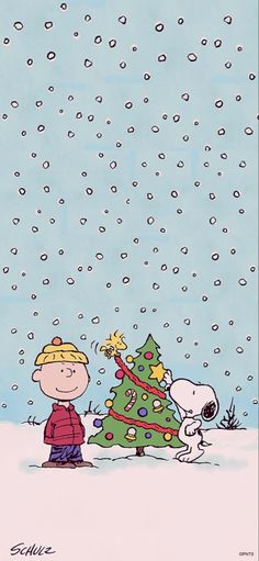 a charlie brown christmas card with snoop and his dog by a tree in the snow