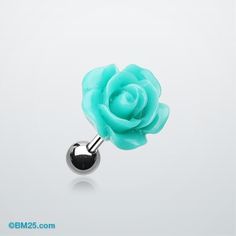 an image of a flower shaped surgical steel barbell ring with turquoise colored rose on it