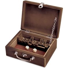 an open briefcase with dice and chain in it