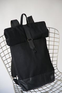 Black Laptop Backpack - Black Leather Backpack - Vegan backpack - Rolltop Backpack - Minimalist Backpack - Big laptop Rucksack - Travel Backpack - Back to School - Big Black Bag, Black Backpack, Black Leather Bag, Laptop Backpack, Black Canvas Bag, Black Rolltop Bag, Travel Backpack,School Backpack - Made to order - allow 7 days to create it for you - Original pattern and design - Handmade by me with care and love - Made from Sturdy black drill fabric and black faux leather fabric, the lining is Practical Black Backpack For On-the-go, Black Canvas Backpack With Leather Handles, Black Rectangular Canvas Backpack, Functional Black Leather Backpack For On-the-go, Modern Black Backpack For Commuting, Practical Black Everyday Backpack, Modern Black Backpack For On-the-go, Modern Black Backpack For Everyday Use, Black On-the-go Standard Backpack