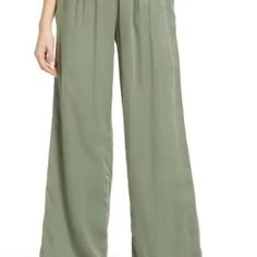 Elastic Waist Wide Leg Pants Caslonpull On Wide Leg Pants Color Green Dune True To Size S=4-6 High Rise 26 1/2" Inseam; 16" Leg Opening; 11 1/2" Front Rise; 16 1/2" Back Rise Elastic/Drawstring Waist Slant Pockets 100% Cotton Machine Wash, Line Dry Chic Green Relaxed Fit Bottoms, High-waisted Rayon Pants For Spring, Green Rayon Bottoms For Day Out, Spring Workwear Rayon Bottoms, Chic Pull-on Pants For Day Out, Rayon Trousers For Day Out, Elegant Green Relaxed Fit Pants, Elegant Rayon Bottoms For Day Out, Elegant Green Bottoms For Day Out