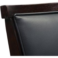 a close up view of the back of a chair with black leather and wood trim