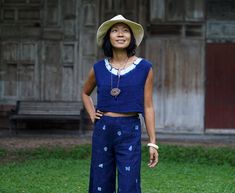 "Blue Indigo Tie Dye Sleeveless Top for Women 100% Double gauze cotton. Indigo natural dye with tie-dye detail on the side. Sizing: Made in one size to fits XS to M / US: 2/4/6/8 Measurement; Chest up to 37'' Pit to pit across 19'' Length top to bottom 15\" Armhole 18'' around. **Model is a size US 6 with 33\"bust 36\" hip. 164 cm tall.** Description: 100% Double Gauze cotton. Very soft and comfy. Indigo natural dye. With tie-dye detail on the sides. Simple round neck with a small slid in the mi Sleeveless Cotton Tops With Natural Dye, Sleeveless Cotton Top With Natural Dye, Casual Sleeveless Top With Natural Dye, Casual Sleeveless Eco-friendly Top, Blue Tops With Natural Dye, Dark Blue Tie Dye, Indigo Top, Dark Blue Tie, Indigo Tie Dye