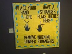 there is a sign on the wall that says, place your hand here remove when no longer strangers