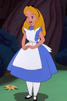 alice from the disney movie is standing in front of a tree