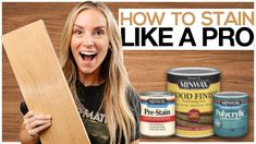 a woman holding a wooden board with paint on it and the words how to stain like a pro