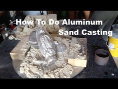 a sand casting machine with the words how to do aluminumum sand casting on it