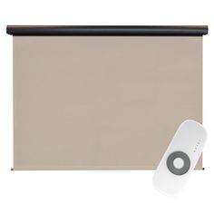 a beige roller shade with a black trim and an air vent in front of it