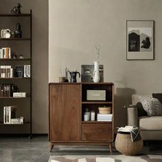 a living room filled with furniture and bookshelves