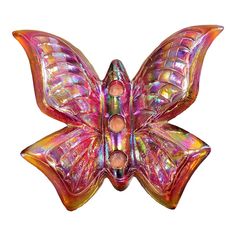 a colorful butterfly shaped object on a white background