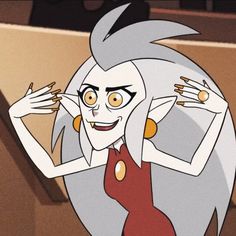 an animated woman with grey hair and yellow eyes in a red dress holding her hands up to her head