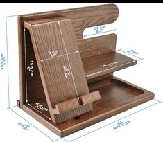 a wooden desk organizer with measurements for the top and bottom section, including an open drawer