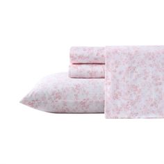 pink floral sheets and pillowcases on white background