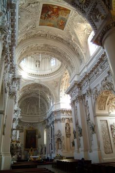 the interior of an old church with high ceilings