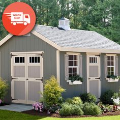 a gray shed with windows and a red sign above it