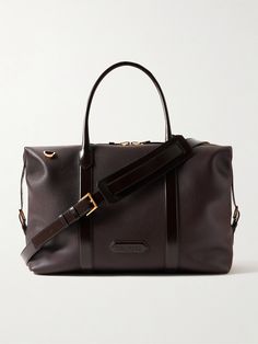 TOM FORD's holdall is constructed from a combination of pebble-grain and smooth leather that'll last through years of travel. Suitable for long weekends or overnight work trips, it's sized to fit two changes of clothes, plus your wash bag and laptop. The detachable shoulder strap allows you to go hands-free. Luxury Briefcase For Overnight Trips, Luxury Leather Duffle Bag For Work, Luxury Workwear Duffle Bag, Leather Holdall, Tom Ford Bag, Ford Accessories, Luxury Sneakers, Stylish Watches, Wash Bag