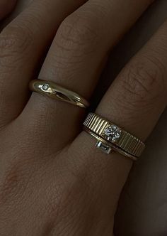 The 0.5cw version of the Solis is our most popular ring style. Inspired by Jennie's mother's vintage pleated ring, the Solis collection represents energy and strength. This ring features a round brilliant diamond prong set in a 14k solid gold ribbed band. 14k solid gold—always Non-hollow Average weight: 5.37g Band width: 5mm (front), 3.5mm (back) Diamond 4 C's: 0.50cw, Round Brilliant, VS2, G/H, Excellent Cut Custom sizing is available. Custom sized pieces are final sale. This piece cannot be re Egagement Rings, Ribbed Ring, Rib Ring, Body Chains, Mother Rings, Classy Jewelry, Jewelry Lookbook, Domed Ring, Jewelry Inspo