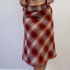 Get ready for fall with Highway Ave's Y2K plaid midi skirt, priced at an affordable $30. This trendy piece seamlessly blends retro and modern styles, making it perfect for autumn outings or casual chic looks. Embrace nostalgia with our highly sought-after plaid midi skirt and stay on-trend this season. Don't miss out – place your order today for the perfect autumn wardrobe addition! Plaid Midi Skirt For Fall, Fall Midi-length Lined Pencil Skirt, Fall Midi Length Lined Pencil Skirt, Chic Long Plaid Skirt, Casual Plaid Midi Skirt, Plaid Midi Skirt Casual Style, Chic Plaid Flared Skirt, Spring Plaid Pencil Skirt, Fall Midi Length Relaxed Pencil Skirt