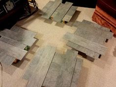 several pieces of wood laid out on the floor