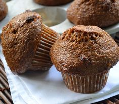 several muffins sitting on top of a white plate