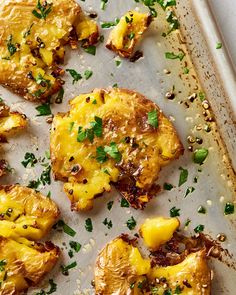 some food is laying on a baking sheet and ready to be cooked in the oven