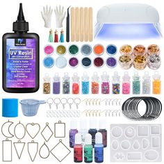 an assortment of crafting supplies including glues, beads and other items