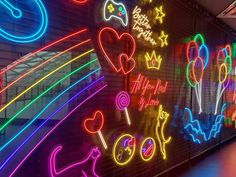 neon signs on the side of a building